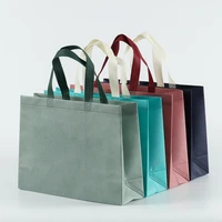 2022 new simple solid color shopping bag fashion light and versatile portable shopping bag foldable beach non woven storage bag