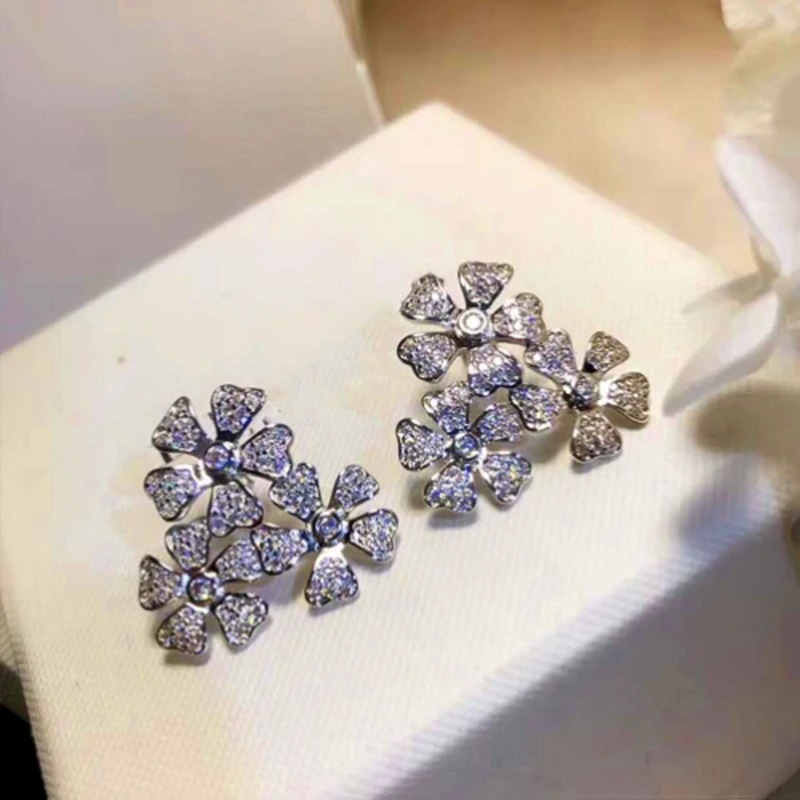 

New New Trendy Fancy Flower Earrings Women White CZ Silver Color Bridal Wedding Ceremony Party Stud Earring Statement Jewelry