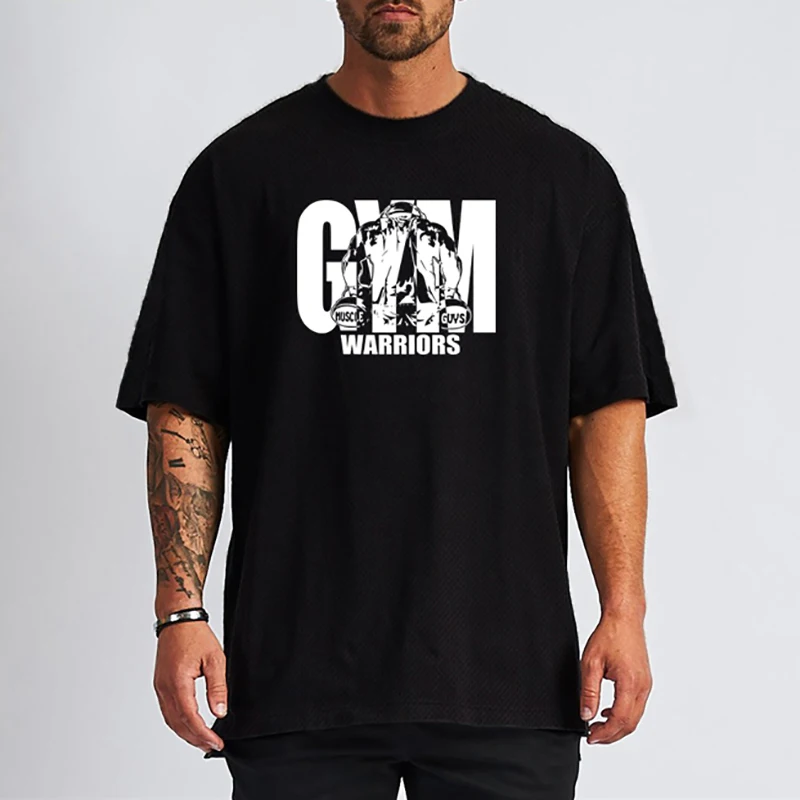

Muscleguys Gym Clothing Mesh Quick Dry Fitness Mens Oversized Loose Half Sleeve T Shirt Hip Hop Streetwear Bodybuilding T-shirt