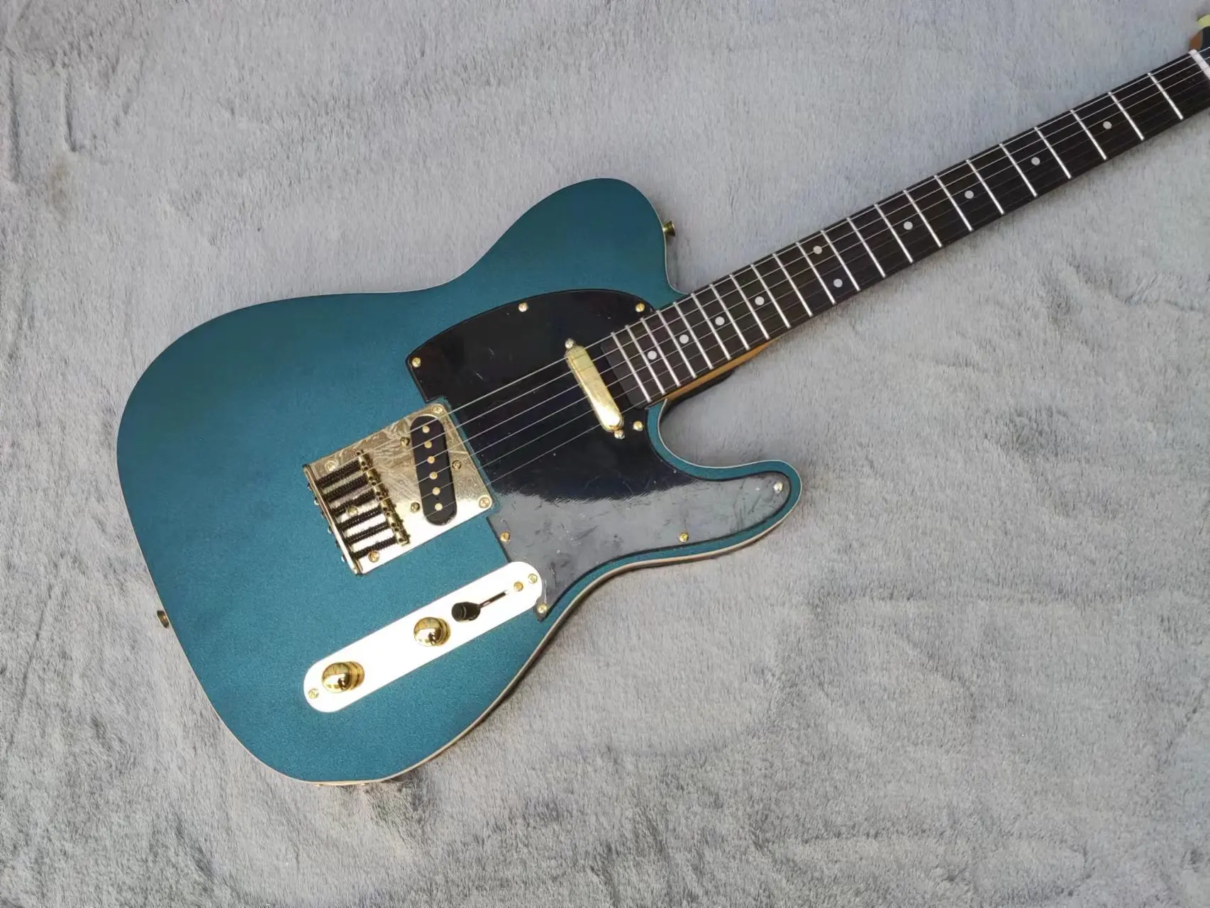 

Customized new style, metal blue TL electric guitar, rosewood fingerboard, black guard, excellent quality, fast delivery