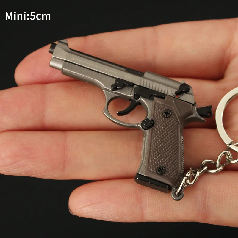 

Брелок для ключей в масштабе 1:4 Mini Glock G17 Beretta 92F, модель металлического пистолета в сборе, коллекционная игрушка-пистолет из сплава, подвеска для взрослых, праздничные подарки