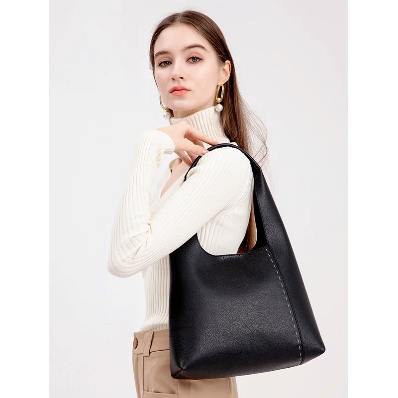 High-class cowhide large-capacity ladies Shoulder bag European and American Retro Stitching tote bag Commuting Vertical handbag