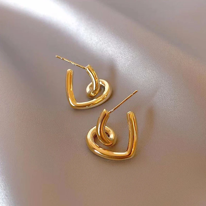 

2023 New Design Irregular Spiral Metal Heart Drop Earrings Korean Fashion Jewelry For Woman Girls Party Gift Simple Accessories