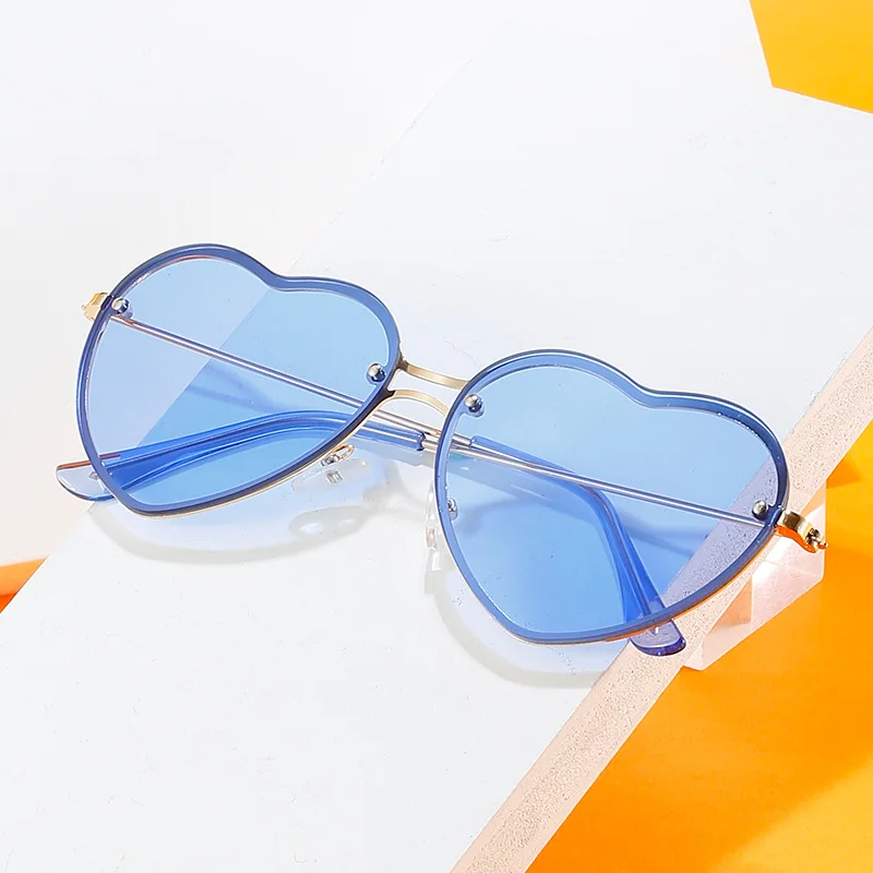 

2022 New Women Retro blue Heart Shape Sunglasses candy color Love Sunglasses Rimless cut red Decorative Glasses shades for women