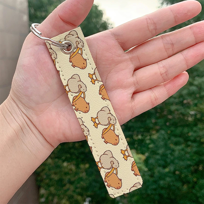 

Fashion Capybara Pelican and capyb Keychain Cute Strap Keyrings Hanging Holder Bag Car Wallet Trinket Keychain Hanging Bag gifts
