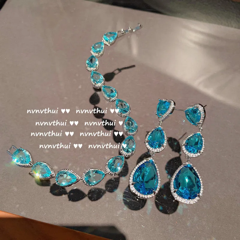 

Bright Sea Blue Water Drop Gem Bracelet 18K Gold Plating Eight Hearts and Eight Arrows Jewelry Swiss Blue Zircon Sweetheart