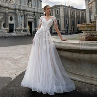 a line sheer neck long sleeve lace appliques tulle wedding dress 2022 button back sweep train bride gown vestidos de noiva