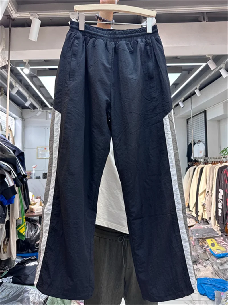 

2023 High Street Spliced Stripe Contrast Simple Sports Pants Men Women Loose Couple Casual Trousers