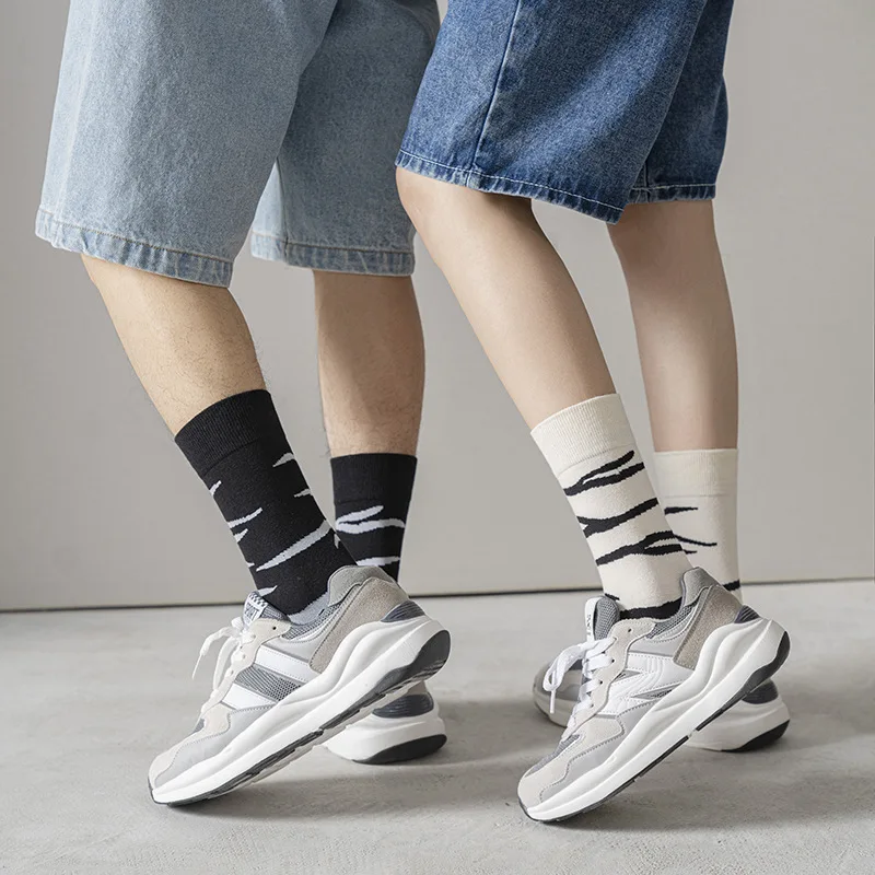 

New personalized black and white zebra pattern men's and women's medium socks Japanese ins net Red Stripe Unisex socks