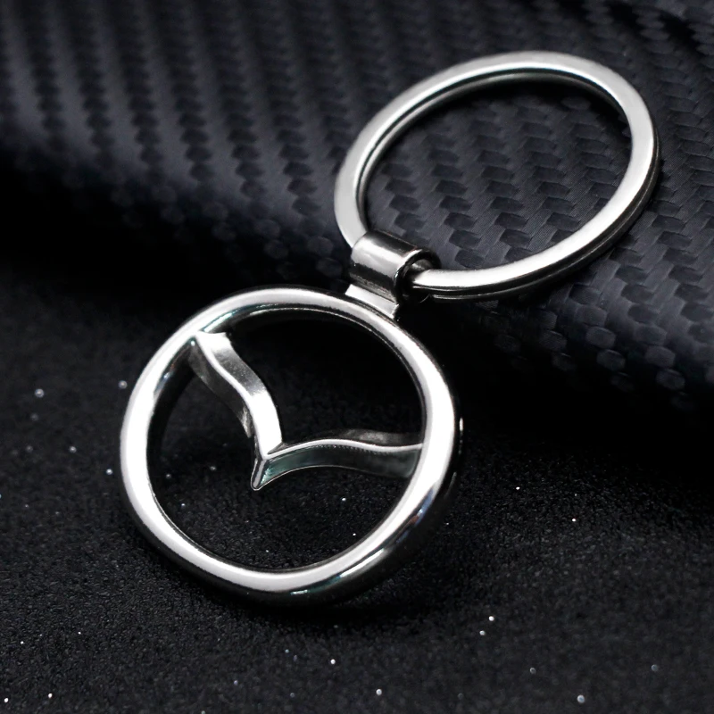

Car Keychain Chrome Silver Car Logo Key Ring Easy To Carry Auto Parts Cutout Keychain Simple For Mazda 323 RX8 7 MX3 MX5 Atenza