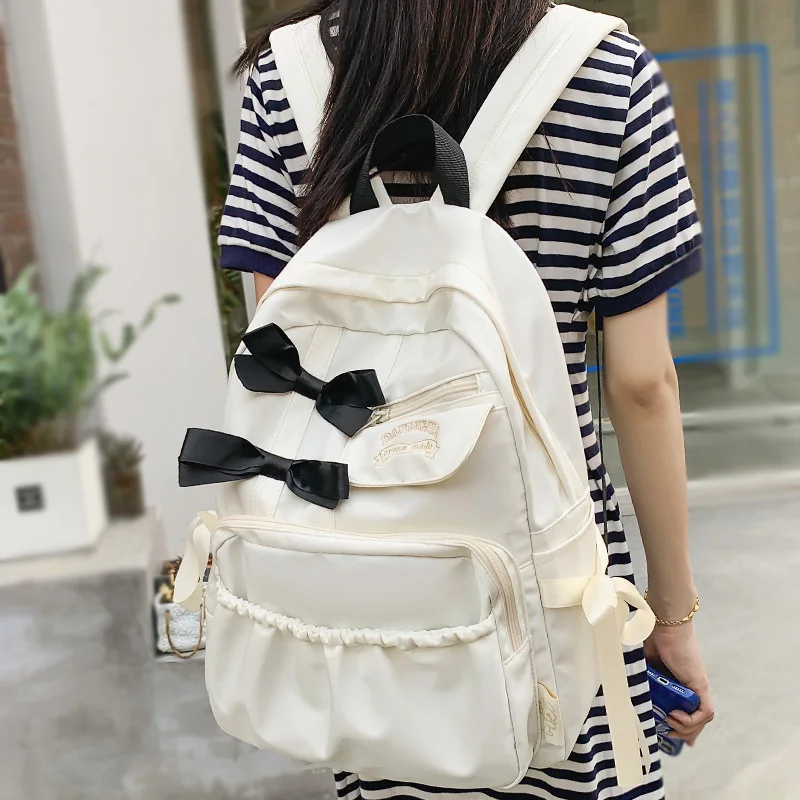 

Female Kawaii Bow White College Backpack Girl Nylon School Bag Women Cute Student Backpack Trendy Ladies Laptop Book Bag Fashion