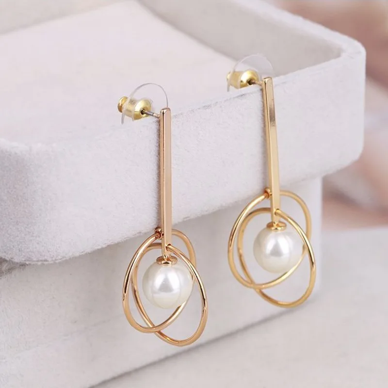 

Metal wind simple temperament geometric lines planet pearl pendant fashion earrings