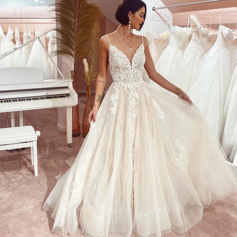 

Boho Wedding Dresses For Women V-Neck Sleeveless Zipper Backless Bride Gowns Spaghetti Strap A-Line Sweep Train Vestido De Noiva