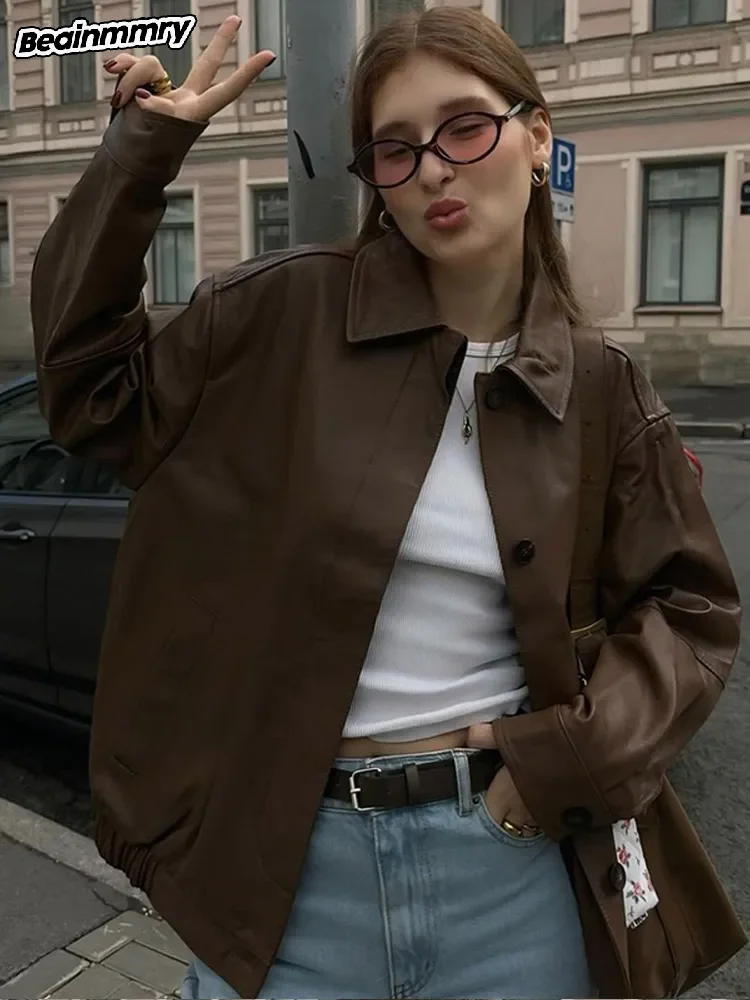 Женская однобортная куртка в стиле ретро однотонная кожаная с лацканами длинным