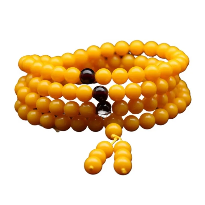 Желтый браслет из пчелиного воска с несколькими петлями