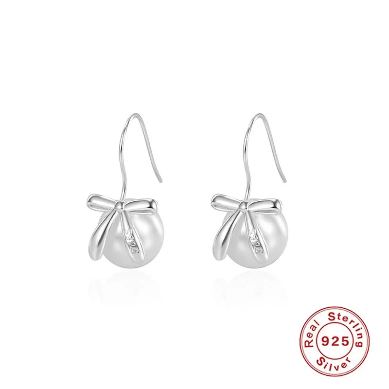 Серьги-подвески из серебра 925 пробы с жемчугом и бантом