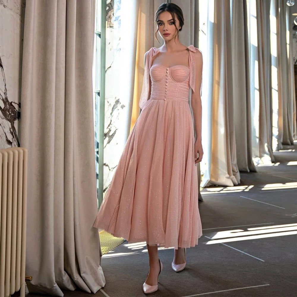 Классические розовые вечерние платья а-силуэта без рукавов длиной до середины