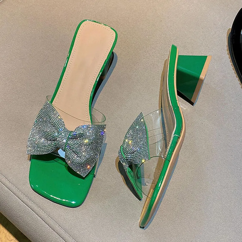 

Rimocy Shining Crystal Bowknot Slippers for Women Summer 2022 Transparent PVC Thick Heel Sandals Woman Slip on Square Toe Slides