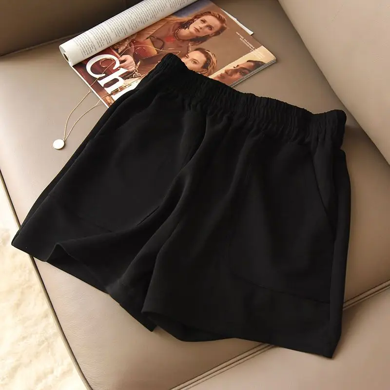 Summer New Elastic Waist Loose Wide Leg Shorts Solid Color Pockets Patchwork Hot Pants Simplicity Casual Women Clothing