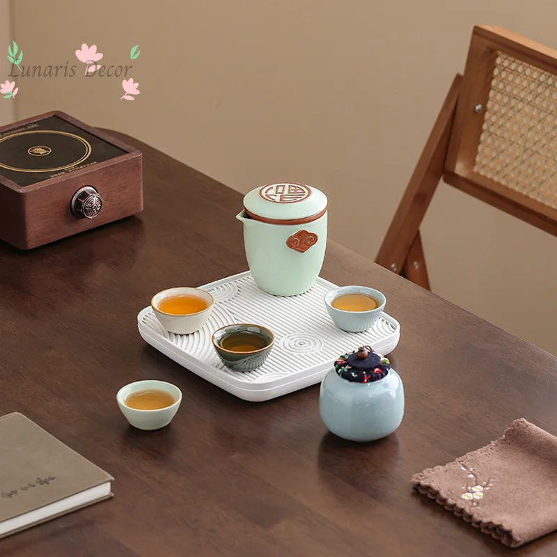 Фото Портативный дорожный чайный набор Ru Kiln Kuaike Cup: маленький керамический набор из одного чайника и четырех чашек для дома №2
