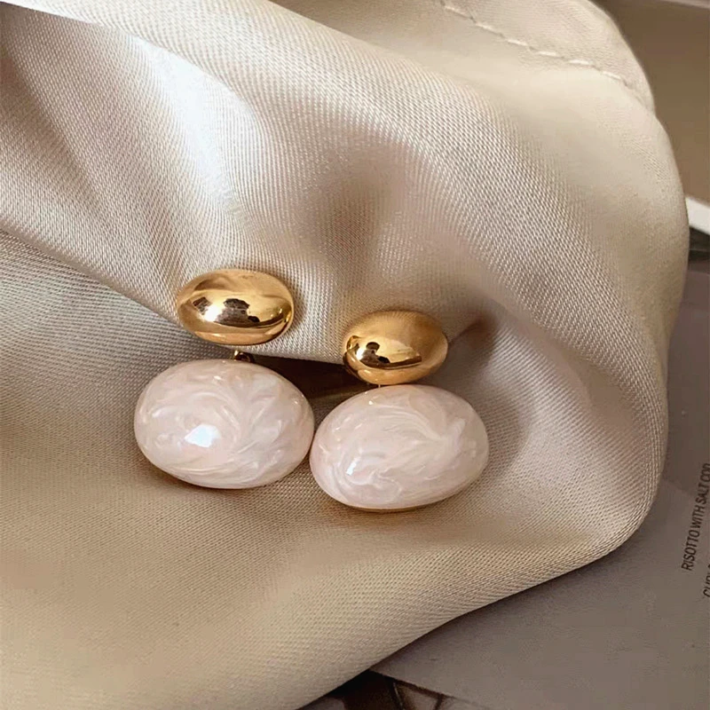 

Korean Light Luxury White Enamel Oval Bean Drop Earrings for Women Simple Temperament Vintage Commuter Jewelry New Gift