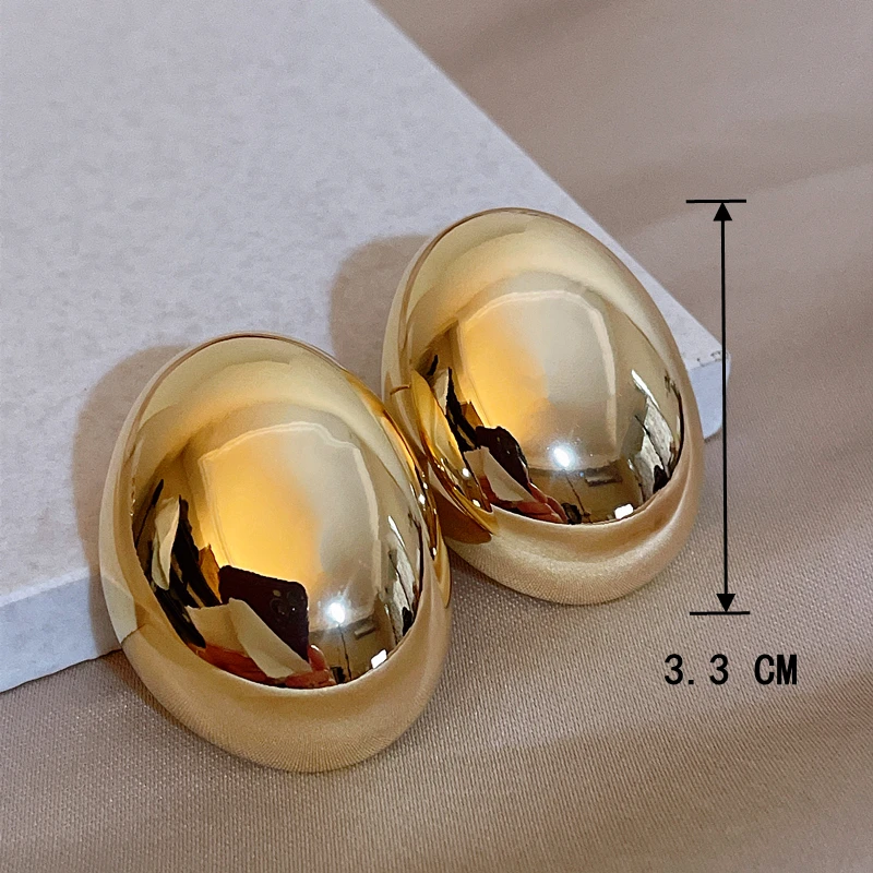 Крупные нестандартные круглые металлические серьги-гвоздики для женщин