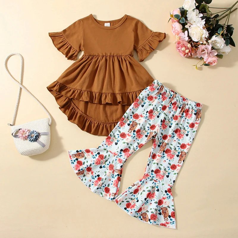 

2023-01-09 Lioraitiin 0-4Years Toddler Girl 2Pcs Spring Outfits Solid Short Sleeve Ruffle Tops Floral Flare Pants Set