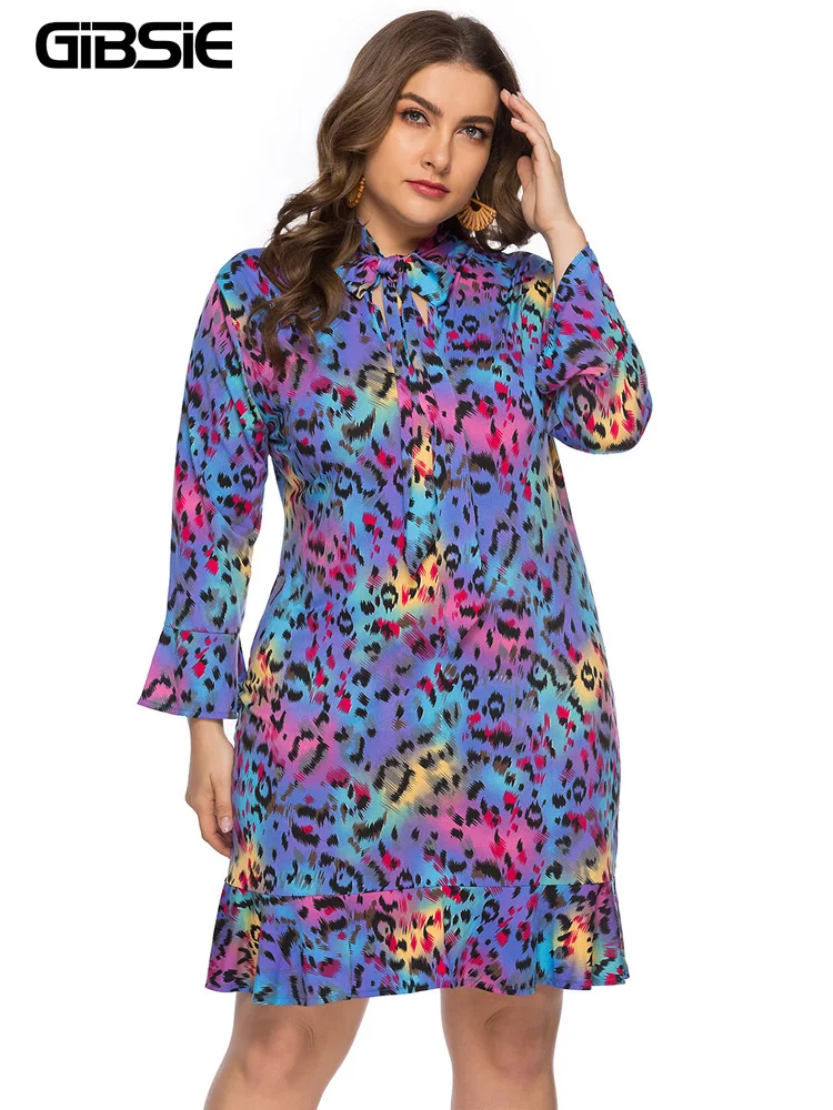 

Женское облегающее мини-платье с леопардовым принтом, длинным рукавом и рюшами