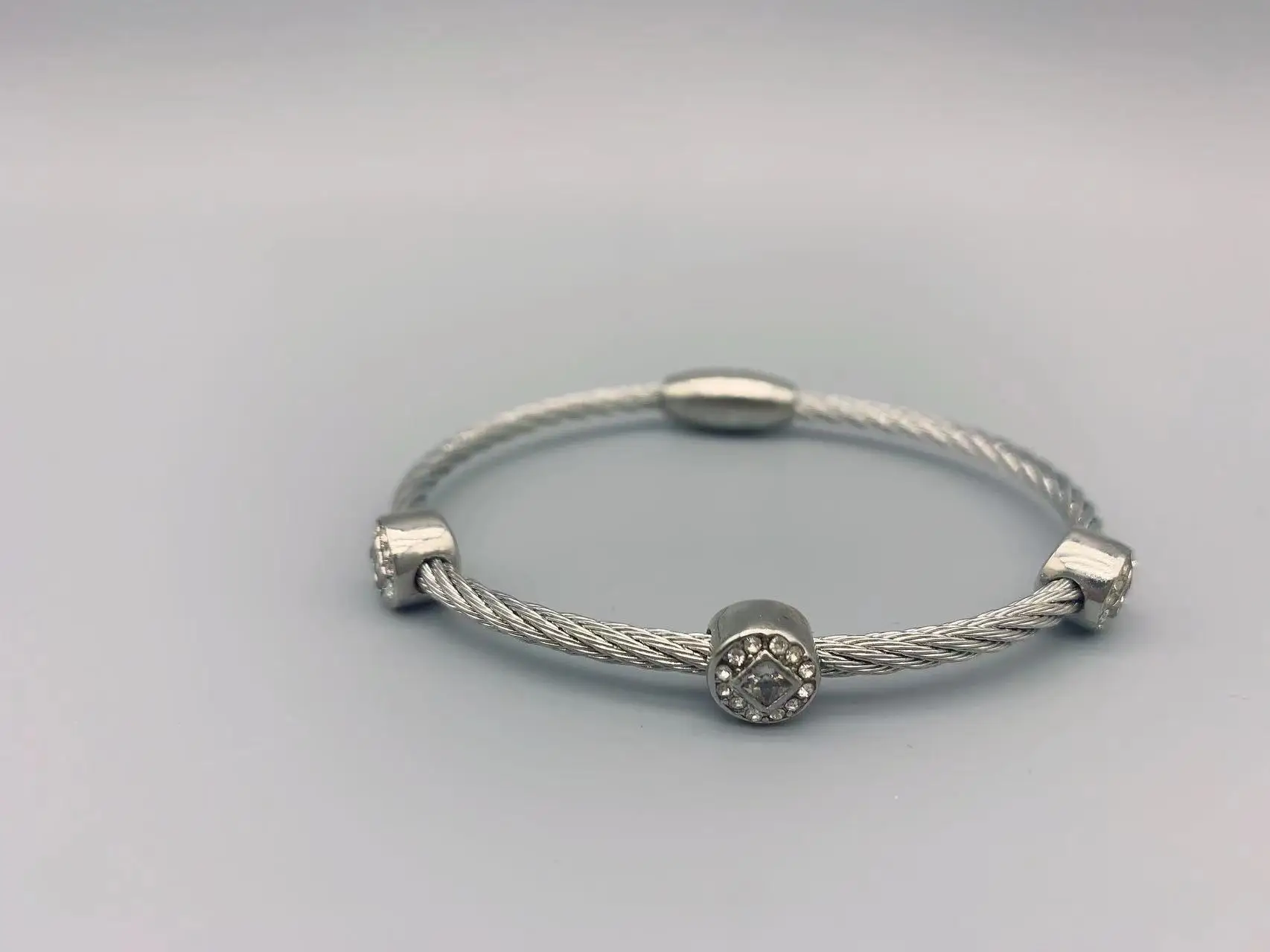 

Le Han Jewelry Silver Cable Bracelet With 3 Round Clear Cubic Zirconia Magnetic Buckle 3mm