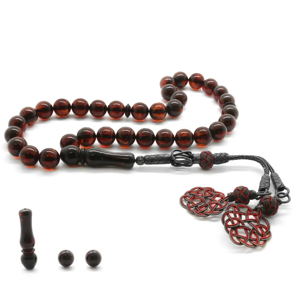 

Nipora 1000 Sterling Kazaz Tasseled Globe Cut Dark Red Drop Amber Rosary