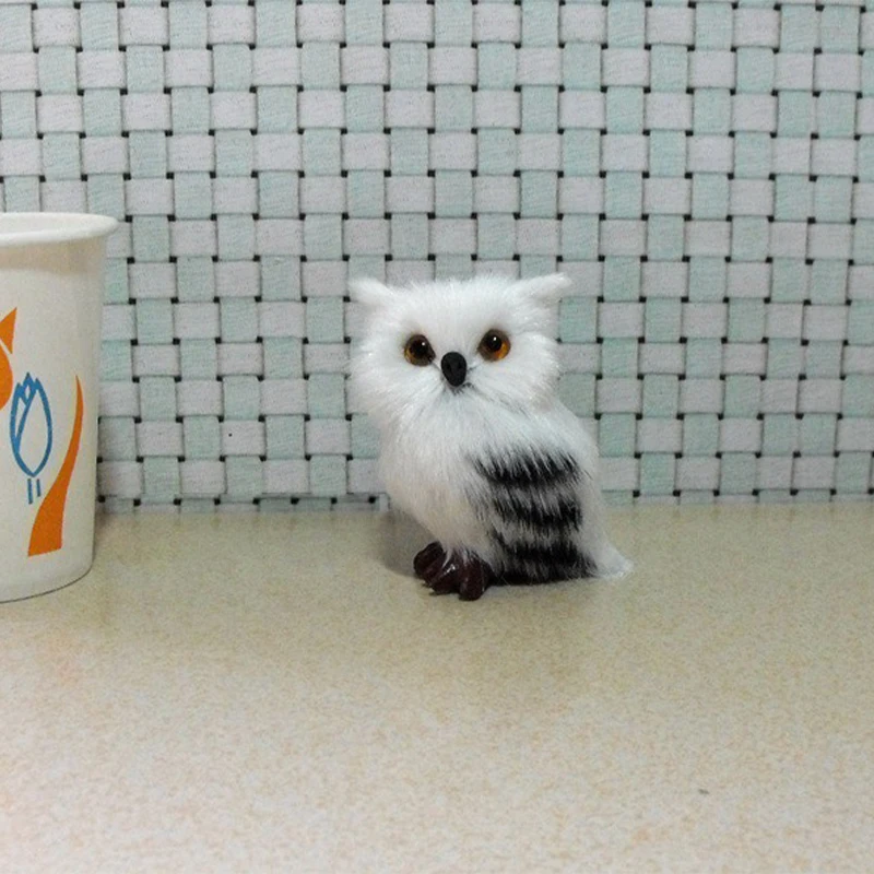 

Декоративная статуэтка совы из пластика