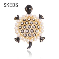 skeds luxury crystal pearl turtles brooches pins for women exquisite rhinestone enamel animal brooch pin party wedding jewelry