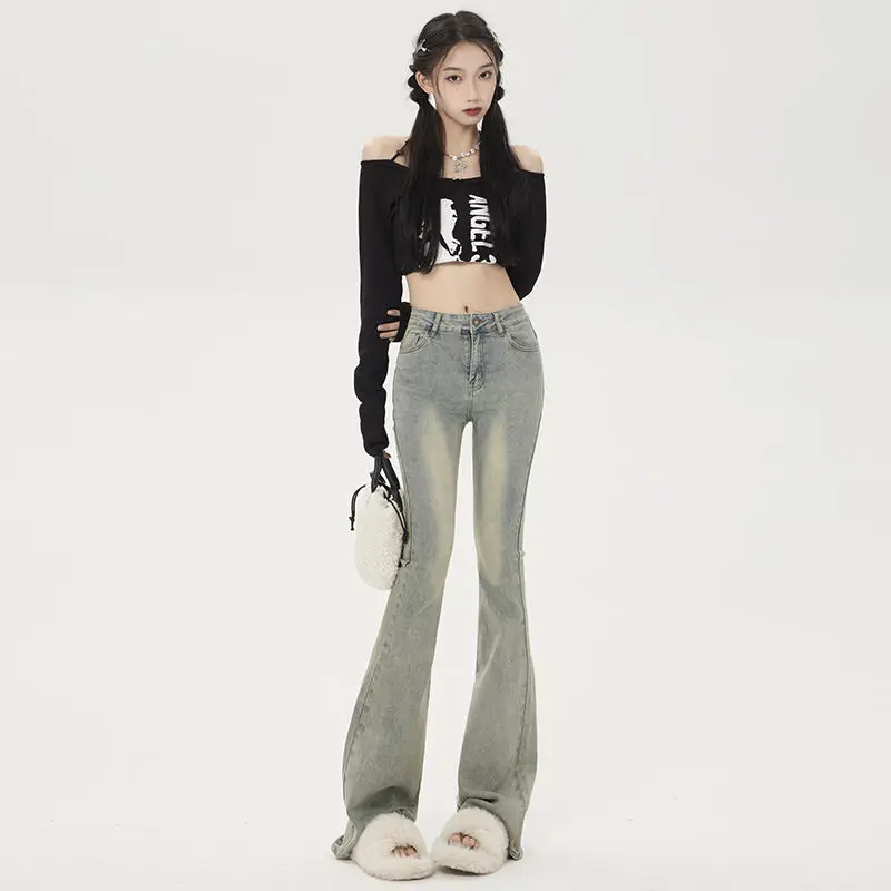

The New Korean Version of The Old Retro Bell-bottoms Grinding White Washed Micro-launched Jeans High-waisted Jeans Women