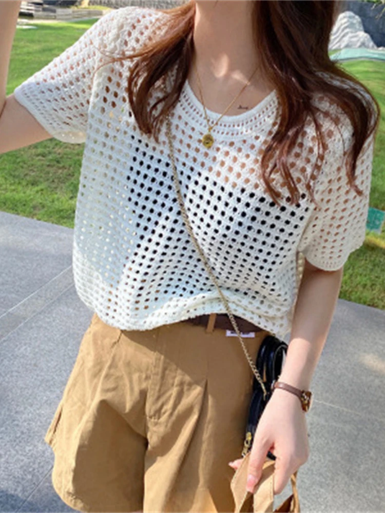 

2023 summer hollow top female short sleeve knitted loose crew neck net woven hollow ice silk blouse female