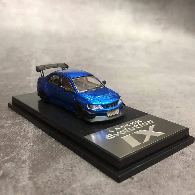 

Модель автомобиля Mitsubishi Lancer EVO IX, металлический, голубой, см 1:64