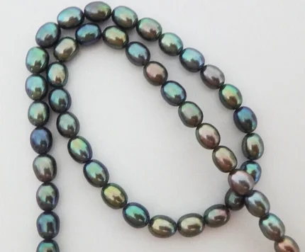 

Free Shipping 18"9X7mm Natural Tahitian genuine black Peacock pearl necklace perfect AAAAA+