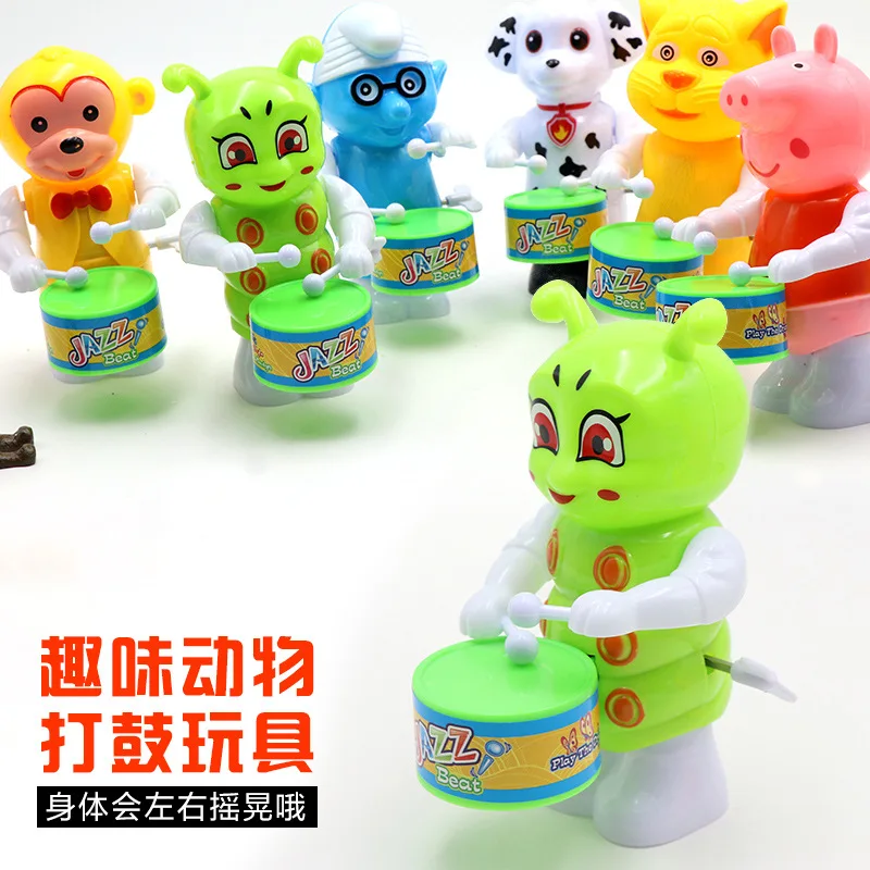 

Best Selling Children's Educational Toys Winding Clockwork Toys Drum Powder Piggy Children's Holiday Gift Toys