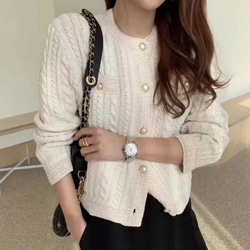 

Elegant Knitted O-Neck Pearl Buckle Cardigan Sweater Woman Office-lady Twist Korean Long Sleeve Loose Top Fashion Clothing 28043