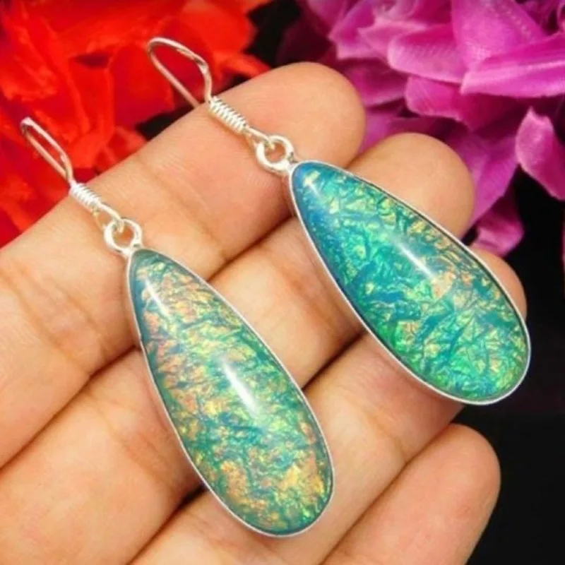 

A Pair of Fashionable Moonstone Earrings Long Horn Water Drop Crystal Moonstone Earrings for Women