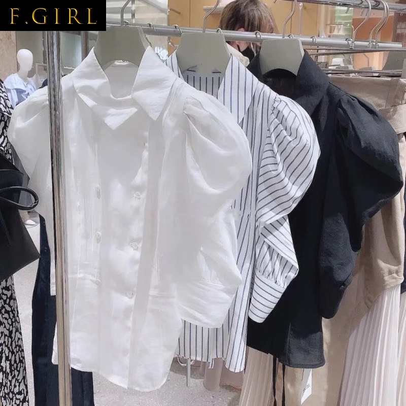 

Блузка женская ассиметричная двубортная с лацканами и пышными рукавами