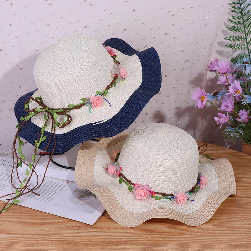 

4 color available wave big brim Sunshade beach straw hat with garland used for women Sunscreen and UV protection straw sunhat