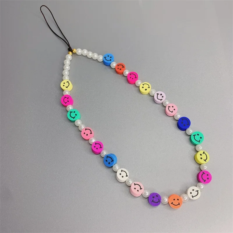 

mobile phone pendant new ins acrylic soft pottery color smiley mobile phone lanyard wrist simulation pearl mobile phone chain