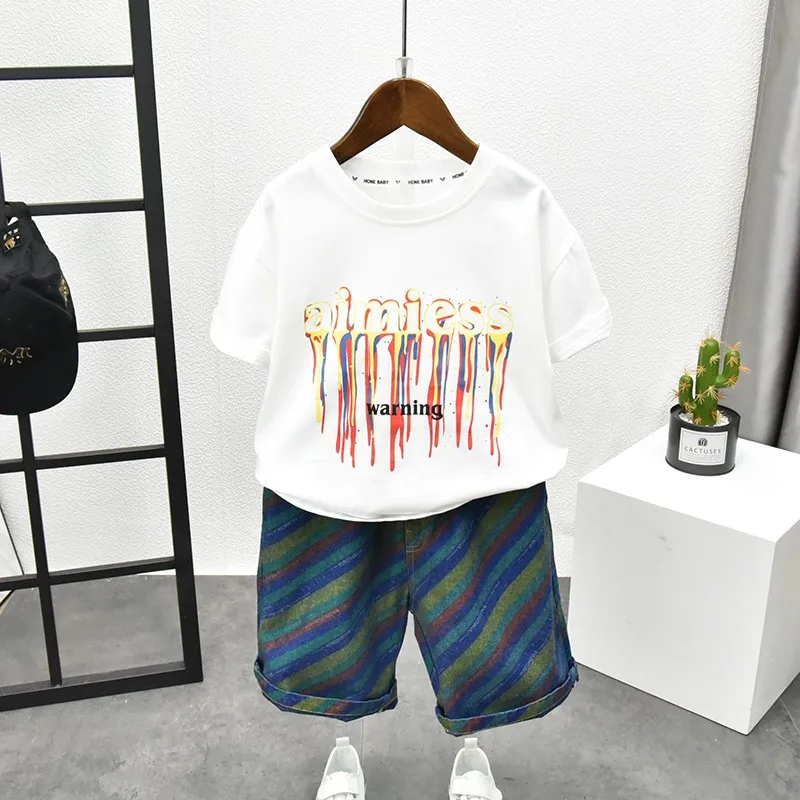 

Летняя одежда для девочек, модный детский костюм для мальчиков с мультяшным принтом, одежда с коротким рукавом, комплект из 2 предметов, 2 шт./...