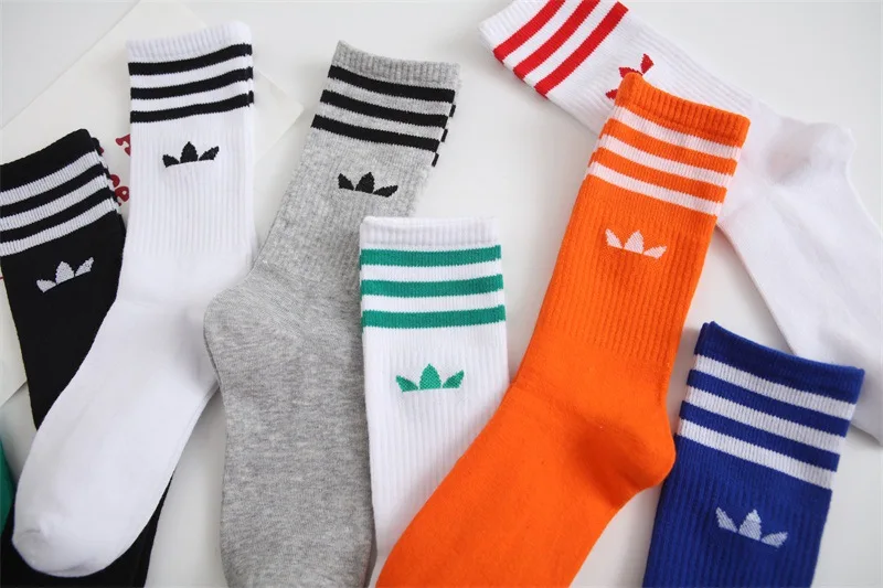 New fashion executive sports socks advertising clover men's and women's cotton socks 2023Ins tide socks striped socks