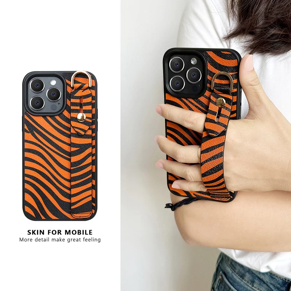 

Zebra PU wrist strap phone case Apple 14pro 11max iphone13/12/11 stylish personality phone case with stand