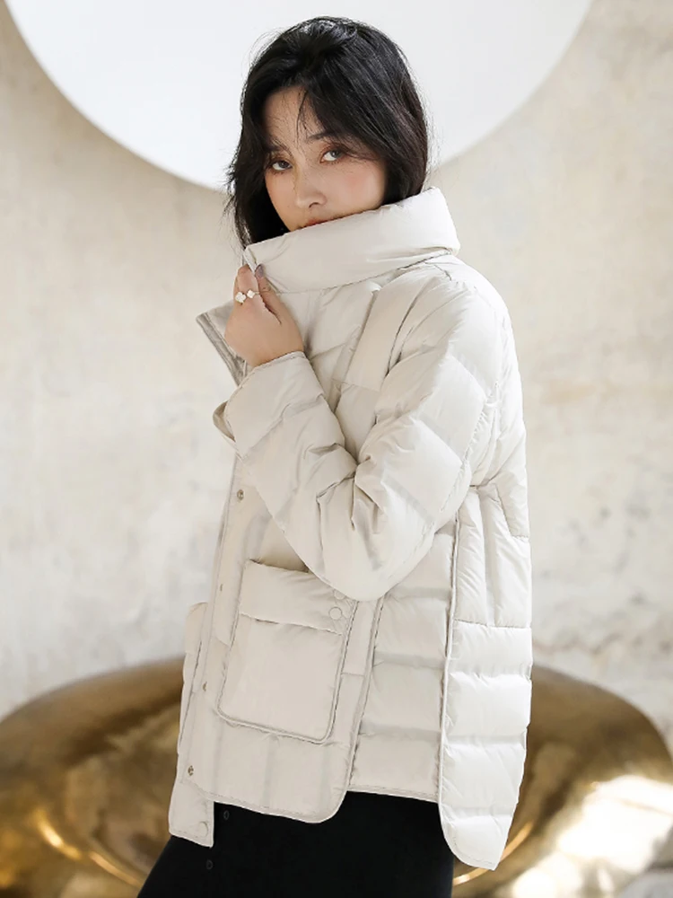 Женский короткий пуховик с воротником-стойкой на осень/зиму