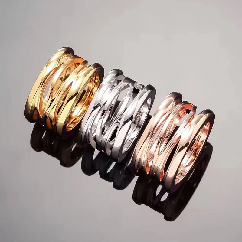 

Titanium steel ring jewelry wide version spring fault shape titanium steel hollow ring fashion jewelry
