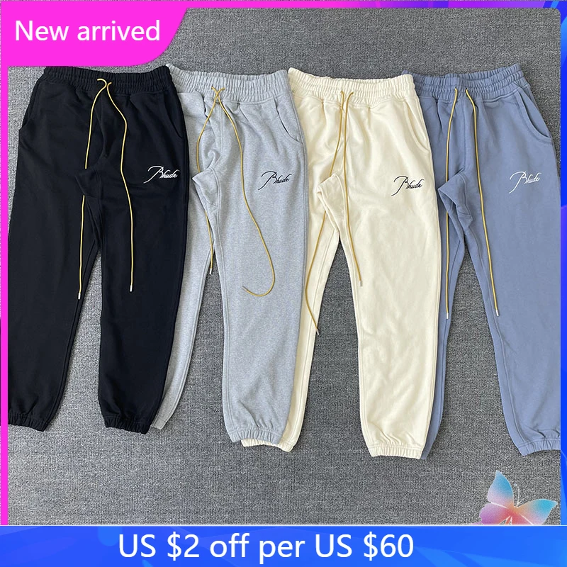 

Multicolor RHUDE Sweatpants Embroidered Slogan Logo Retro Drawstring Trousers High Street Terry Sweatpants