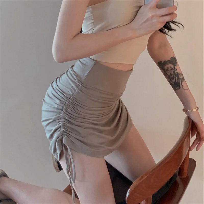 Женская летняя юбка средней длины облегающая пикантная с высокой талией на