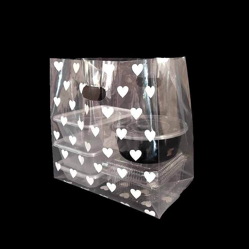 

New 50 piece heart-shaped plastic gift bag with handle Christmas wedding gift bag Baking dessert candy cake packaging bag